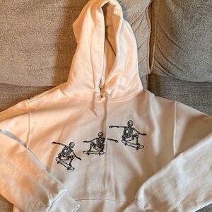 Cream or sand colored hoodie sweatshirt. Skater Bowery Supply Adult Small